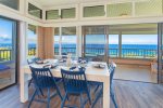  Intimate dining area with ocean views and a beautiful table with seating for six